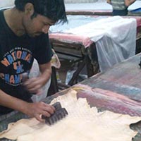 Printer Doing Handblock Printing On Natural Leather Skin